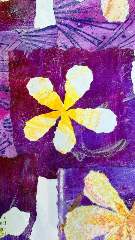Flower artwork made from torn paper collage.