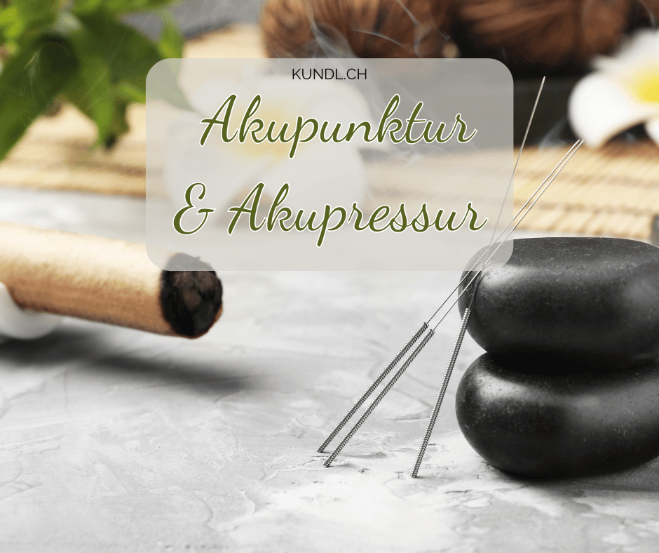 3 Akupunktur-Nadeln an zwei schwarze Steine angelehnt