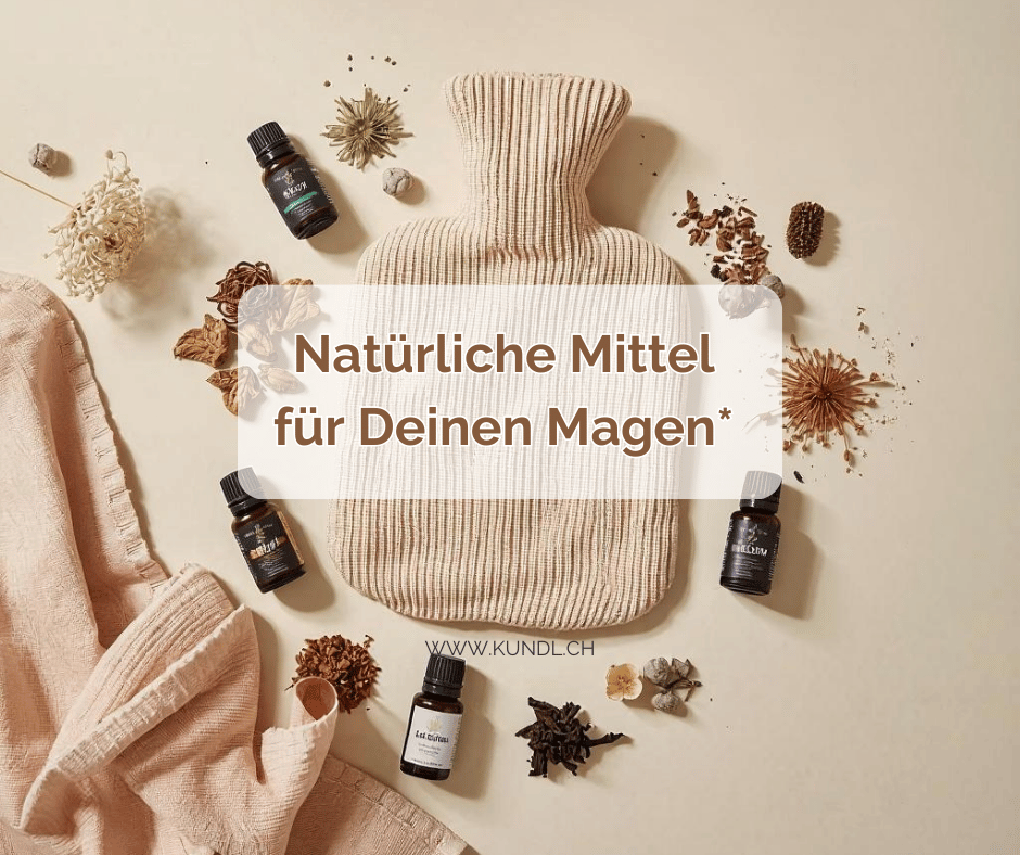 Wärmflasche umgeben mit ätherischen Ölen und Kräutern als natürliche Mittel für den Magen
