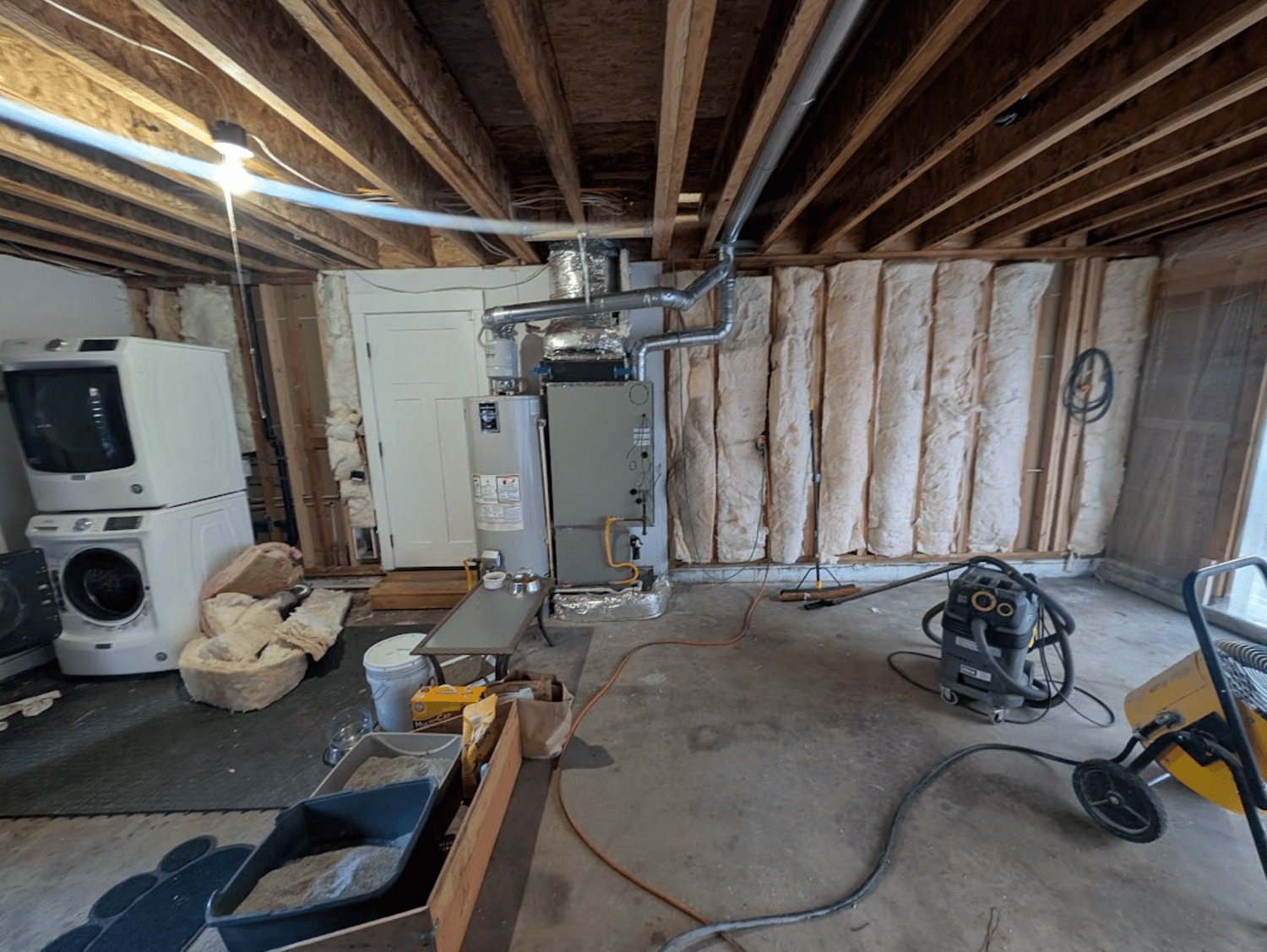 We were able to add the second-story floor joints without moving HVAC and water heater so the homeowners coud continue to live in the main house during construction