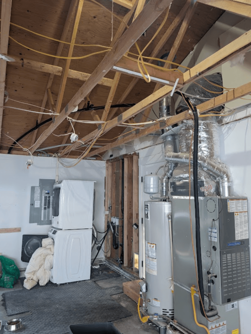 The old trusses were removed, all wires and HVAC needed to be re-reouted around stronger joists that could hold the weight of the new ADU.