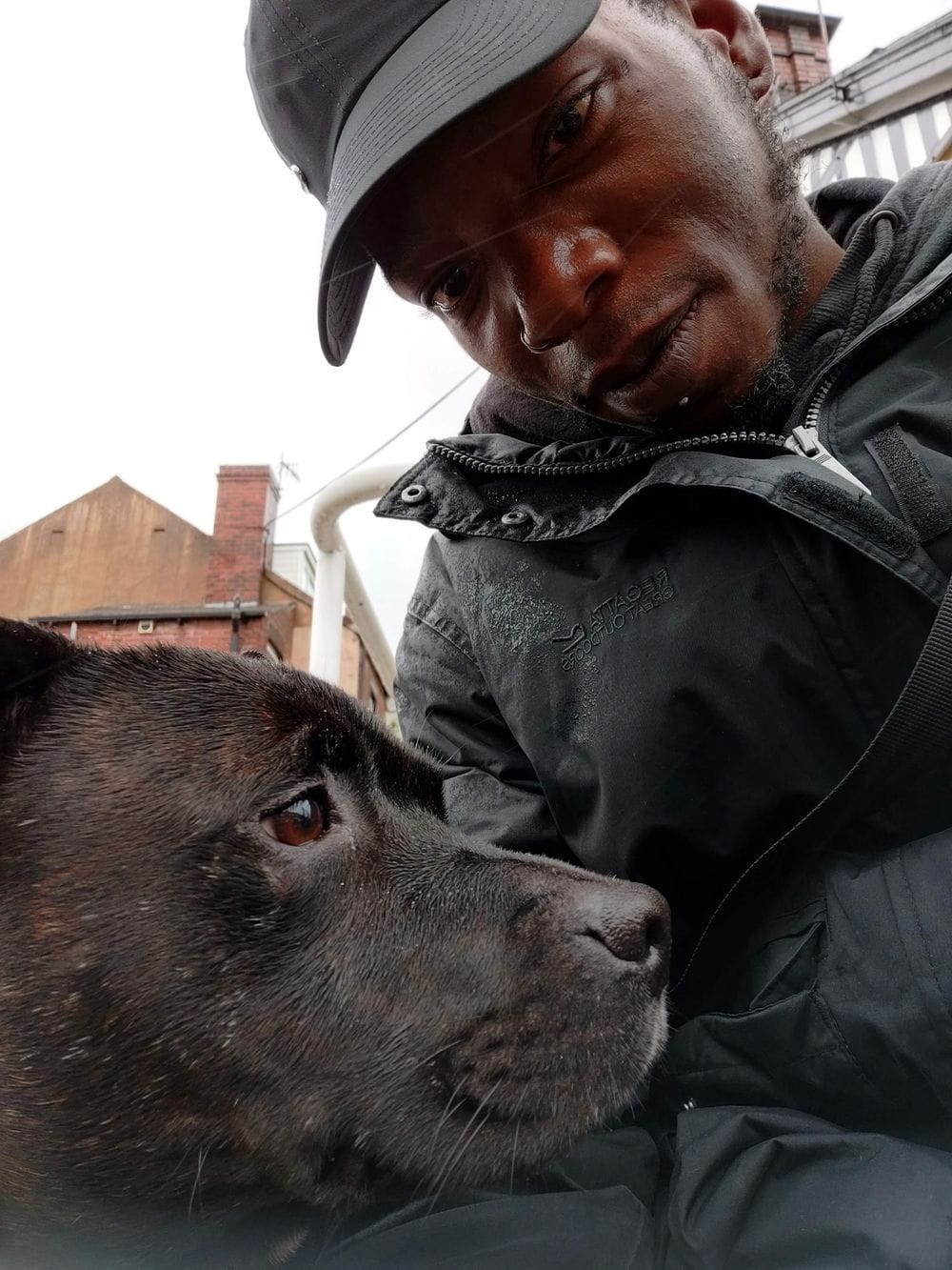 Junior, founder of Junior Trains Dogs, with his dog