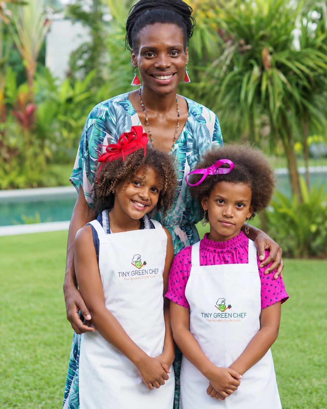 Azizi and her family outdoors