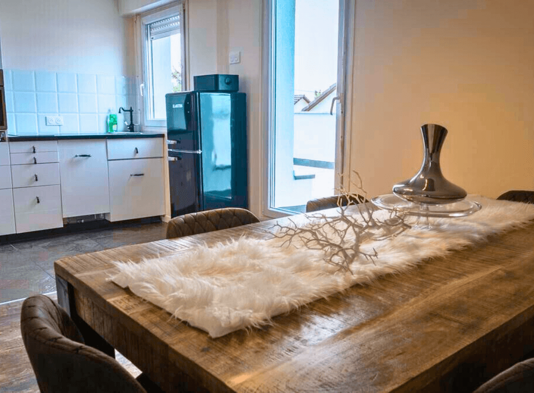 L'espace repas et cuisine de l'appartement "Le Havre"