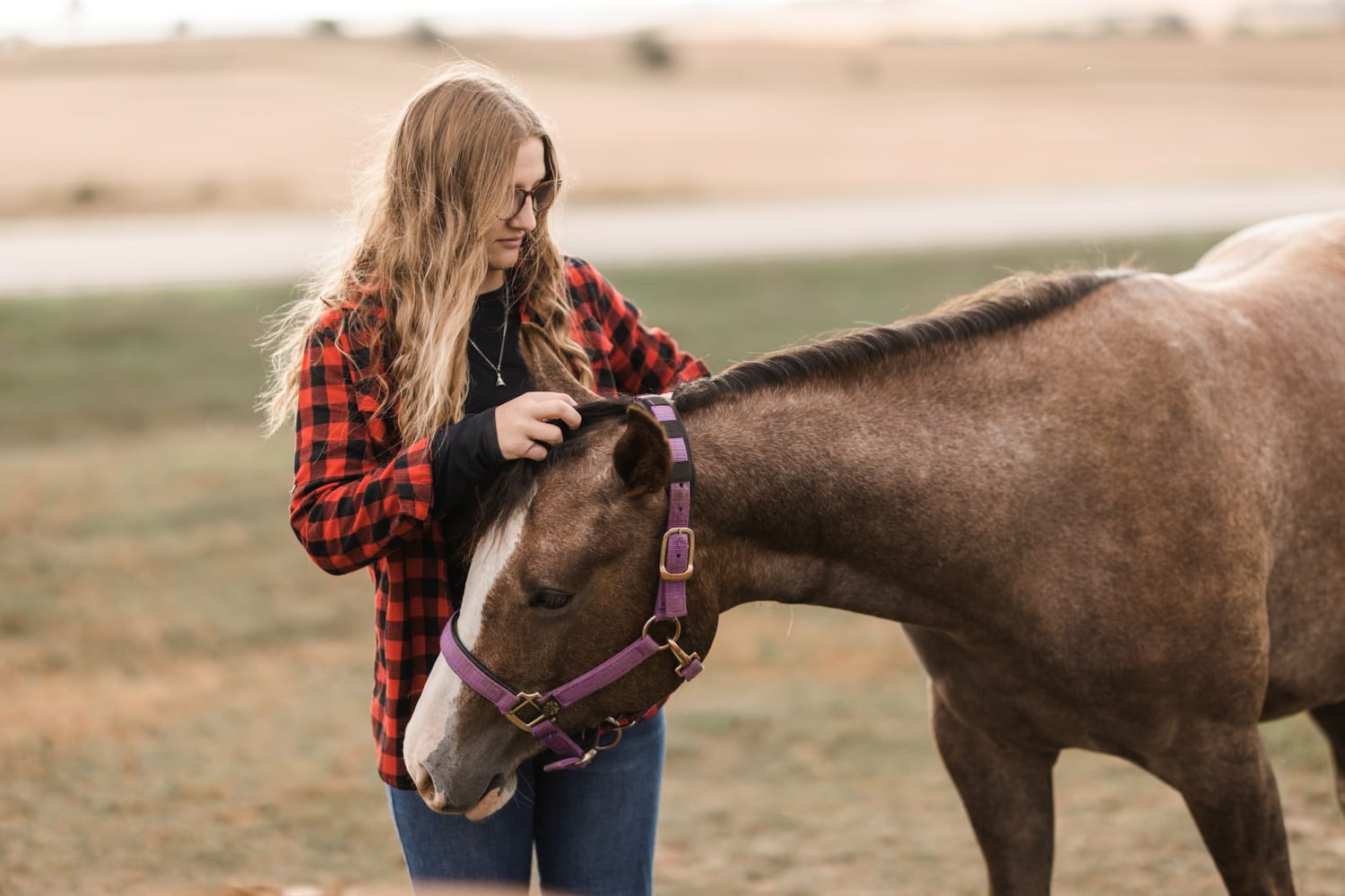 TAGA Ranch Aryanne Robbins with horse Iowa faith based sanctuary stewardship