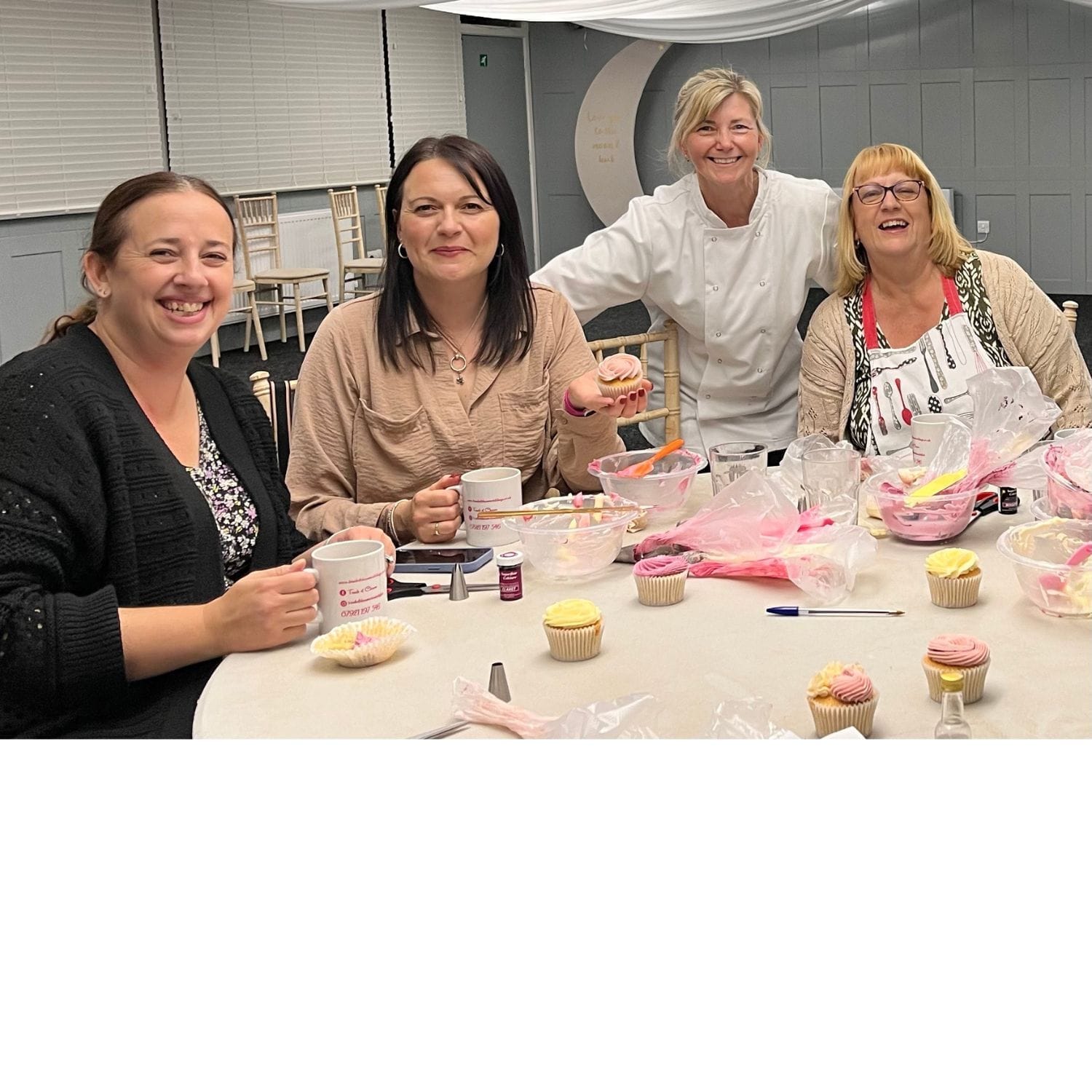 Sharon Burchall, founder of Sharon Burchall Cake Studio — teaching an in-person cake decorating class in Derbyshire, specialising in floral cupcakes and cupcake bouquets, and inspiring beginners and home bakers with friendly, approachable guidance.