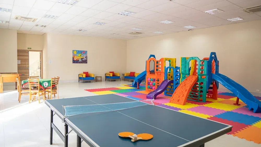 Sala de jogos do Beach Hotel Sunset em Camburi
