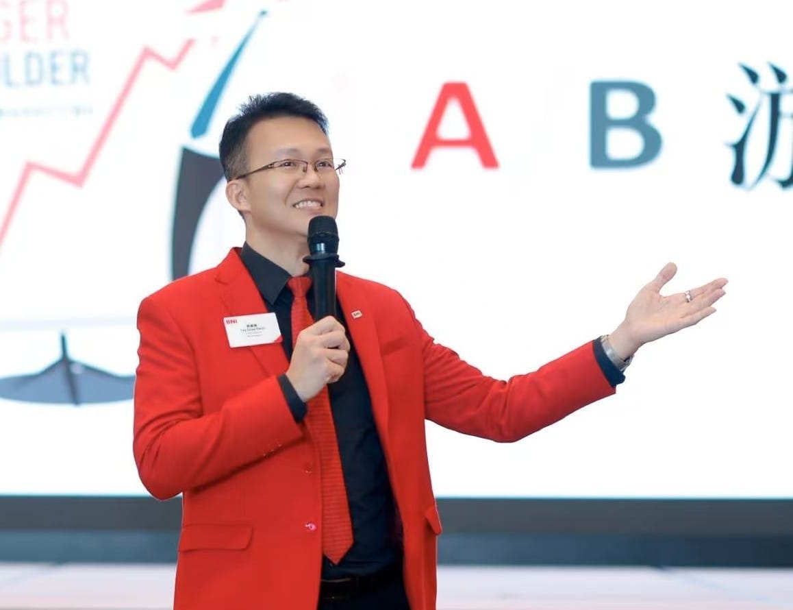Ghee Kwan speaking at a BNI Singapore event