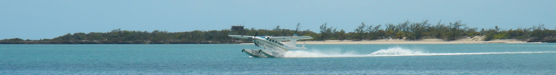 Floatplane water landing in the Bahamas