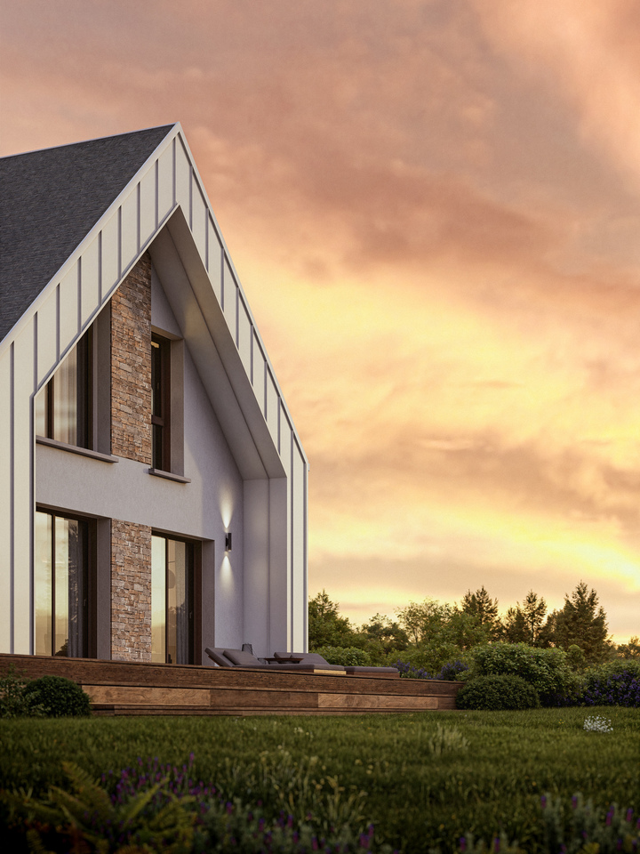 Détail d'une façade de maison moderne avec parement en pierre naturelle et éclairage extérieur au coucher du soleil sur une terrasse en bois.