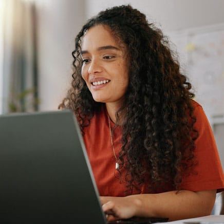 woman looking at a laptop computer