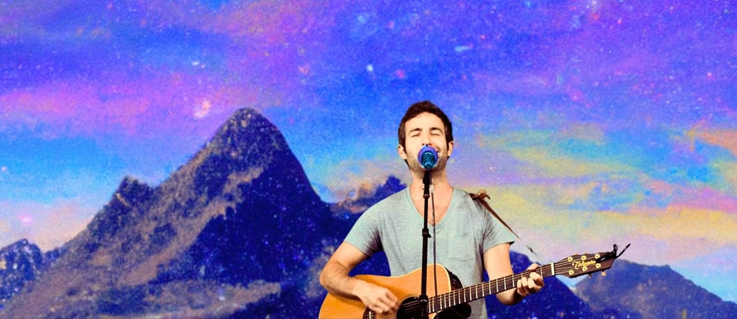 Eric Lumiere performing under cosmic skies