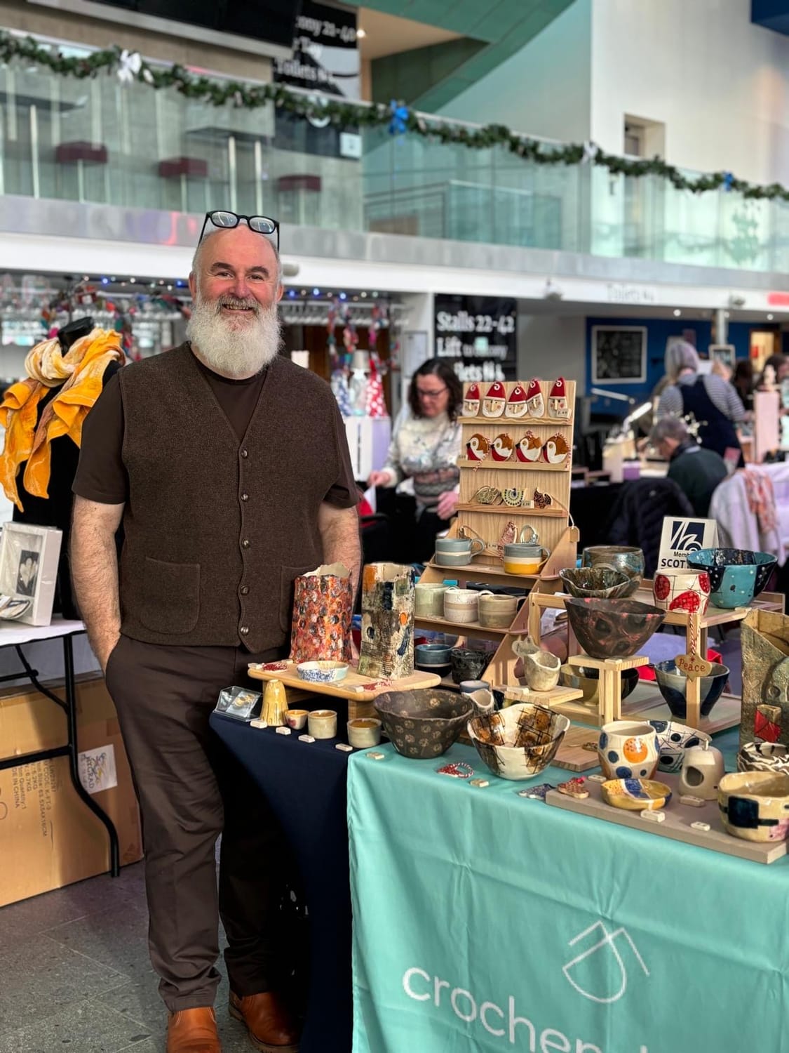 Mark working in his pottery studio