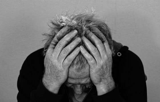 young man overthinking stressed anxious