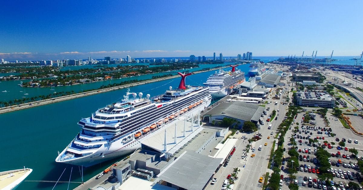 Cruise ships docked together in port