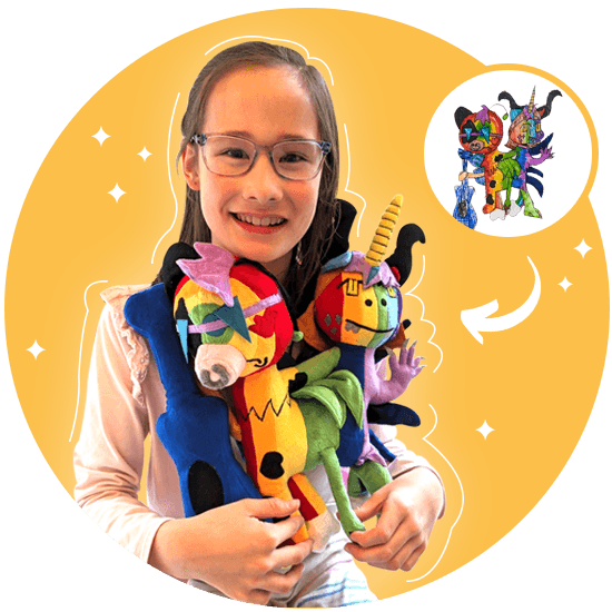 Girl holding custom plush toys made from her artwork.
