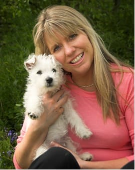 Sharon Bolt celebrity dog trainer with a puppy — gentle online puppy training course and proven dog training programs