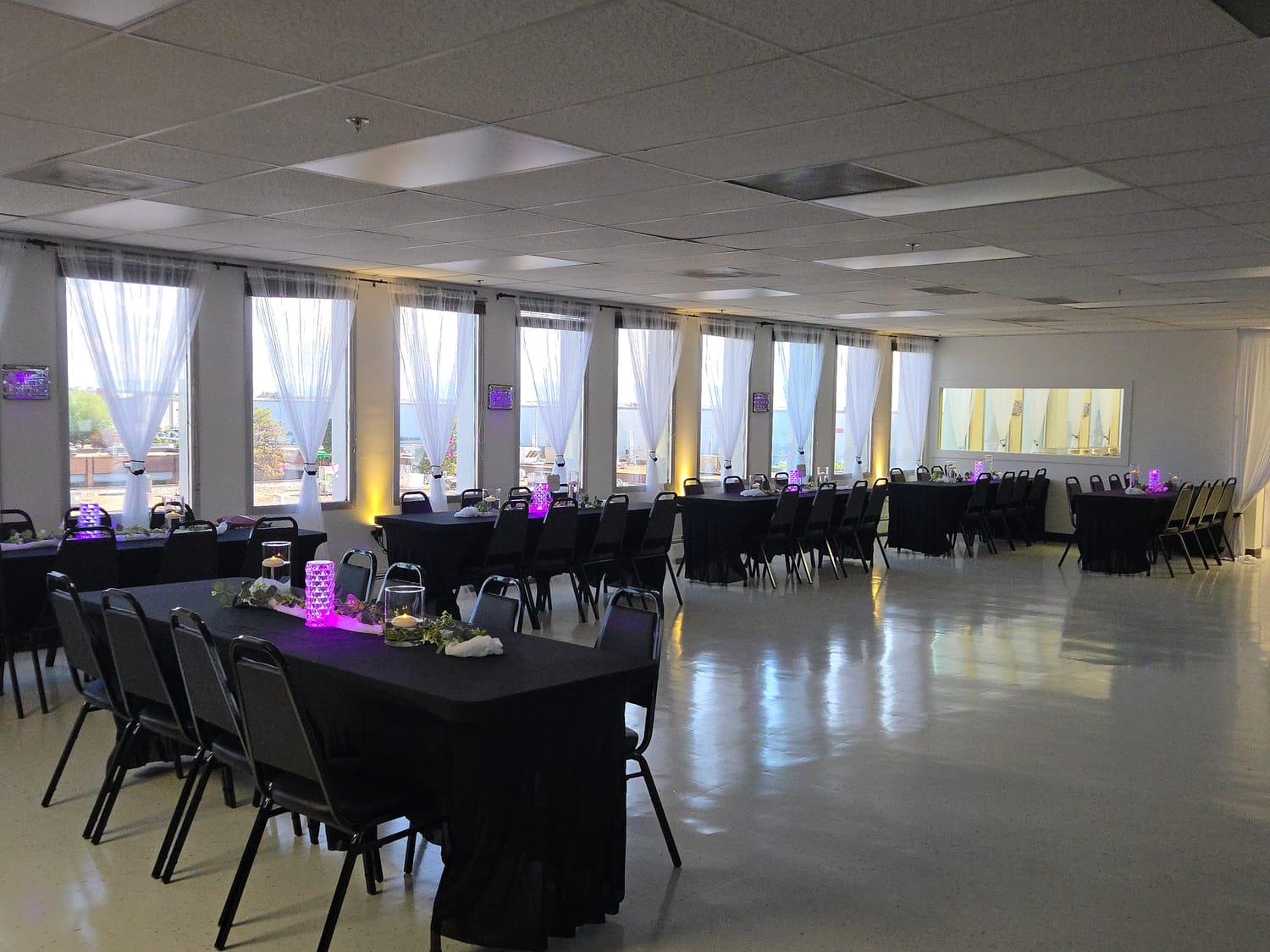 TD Event Space Grand Opening Line Dance Party with Black tables and tablecloths