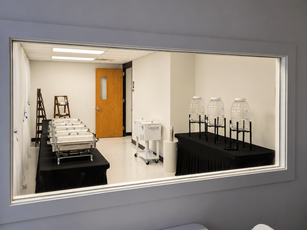 Catering buffet area with food warmers and drink dispensers