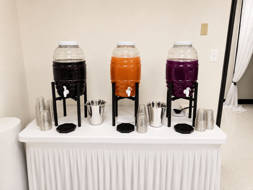 Self-serve beverage station with drink dispensers