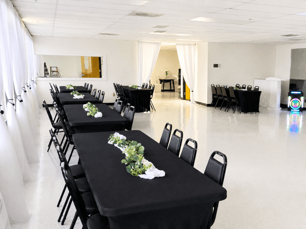 Spacious event room at TD Event Space with black table setup