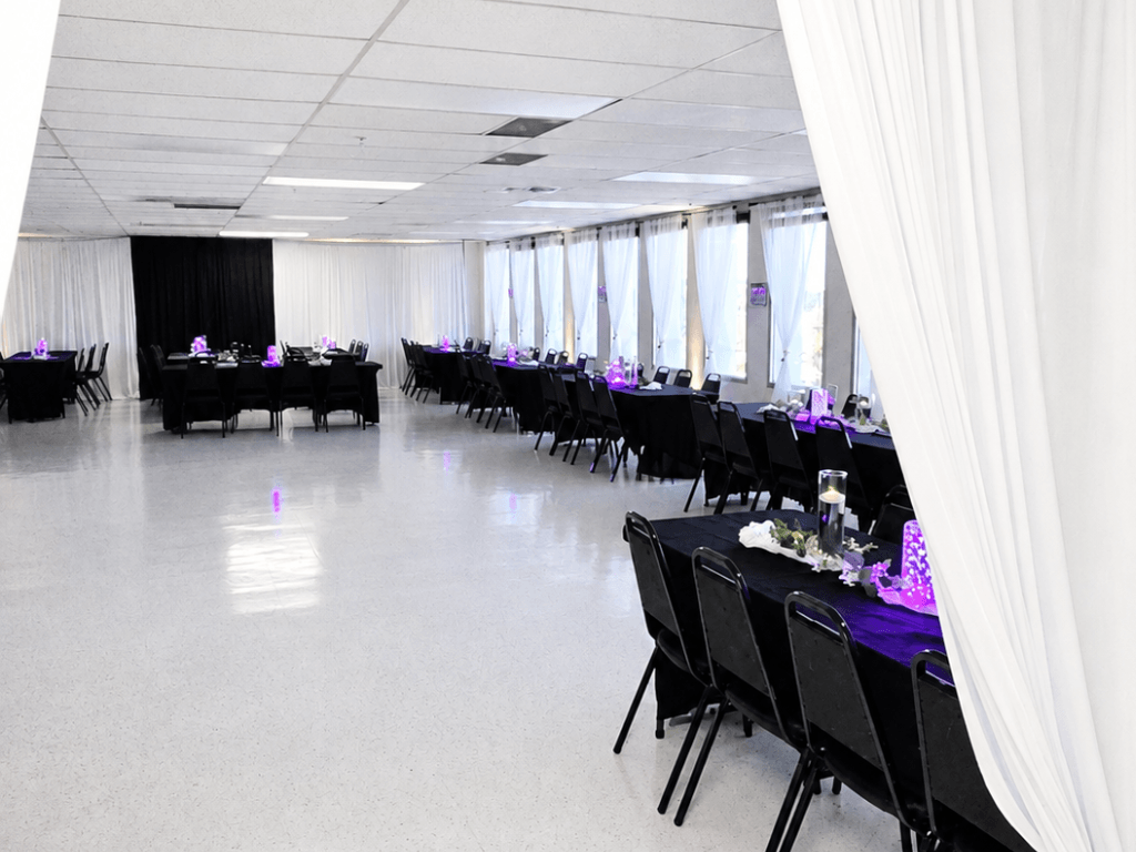 Elegant banquet hall with purple accent lighting