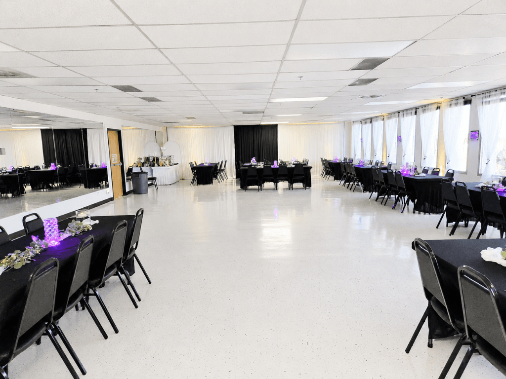 Spacious reception venue with black decor at TD Event Space