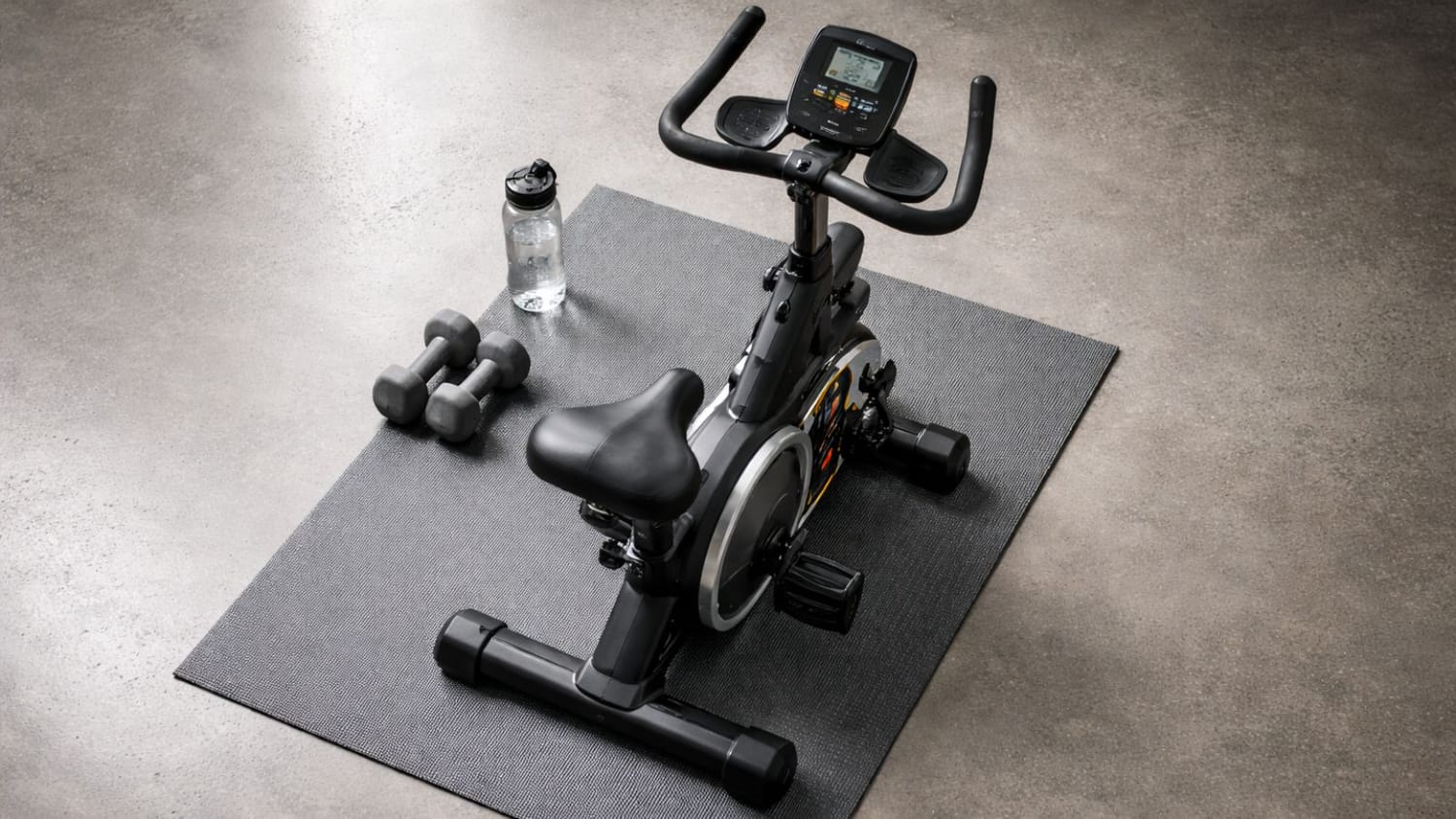 Top down view of exercise bike footprint on a 4x2 mat