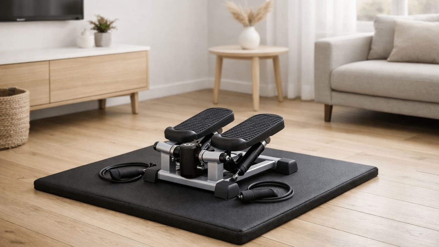 Woman using a mini stepper machine in a sunny studio apartment