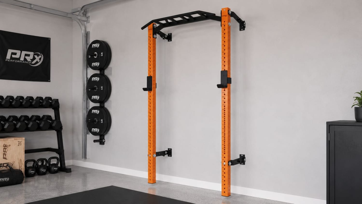 Foldable wall-mounted squat rack in a small home gym