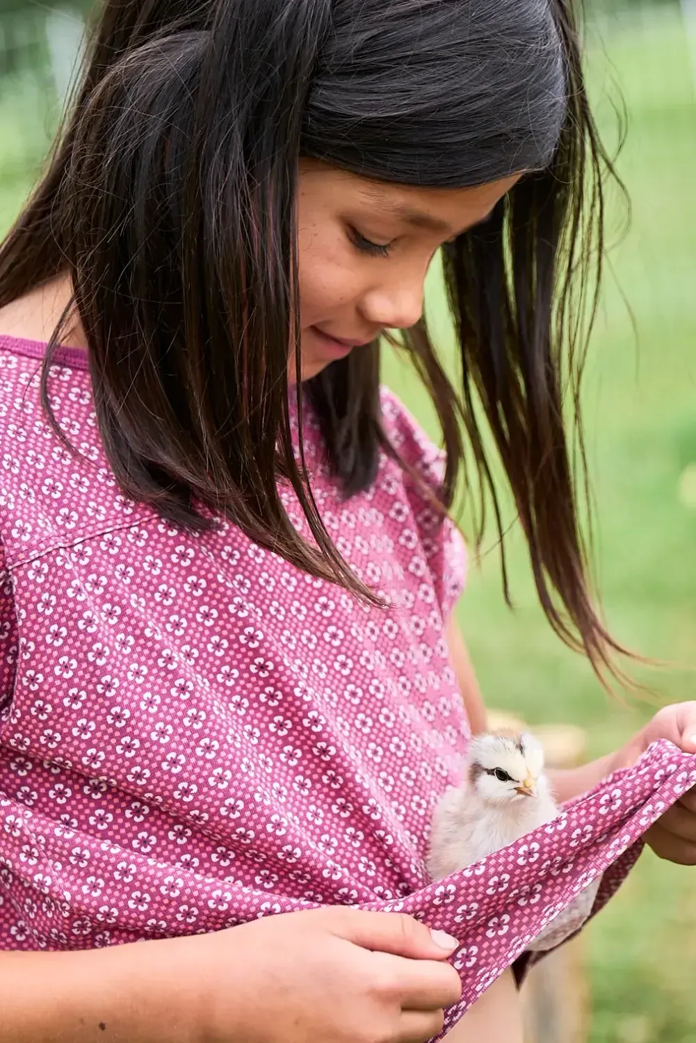Carys playing with colorful birds, an executive function activity that supports focus and empathy in kids.