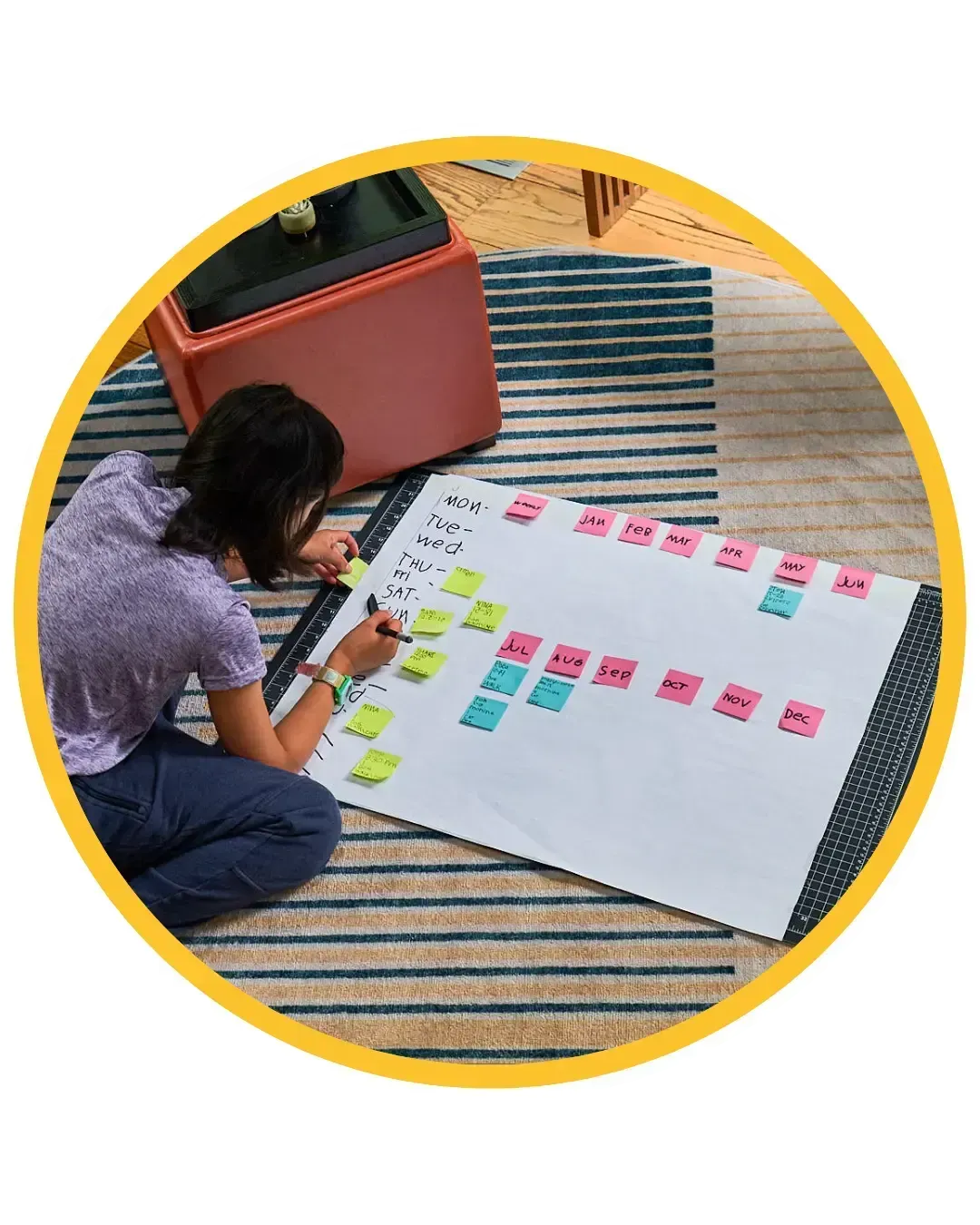 Carys planning her schedule, showing executive function development and childhood independence skills.