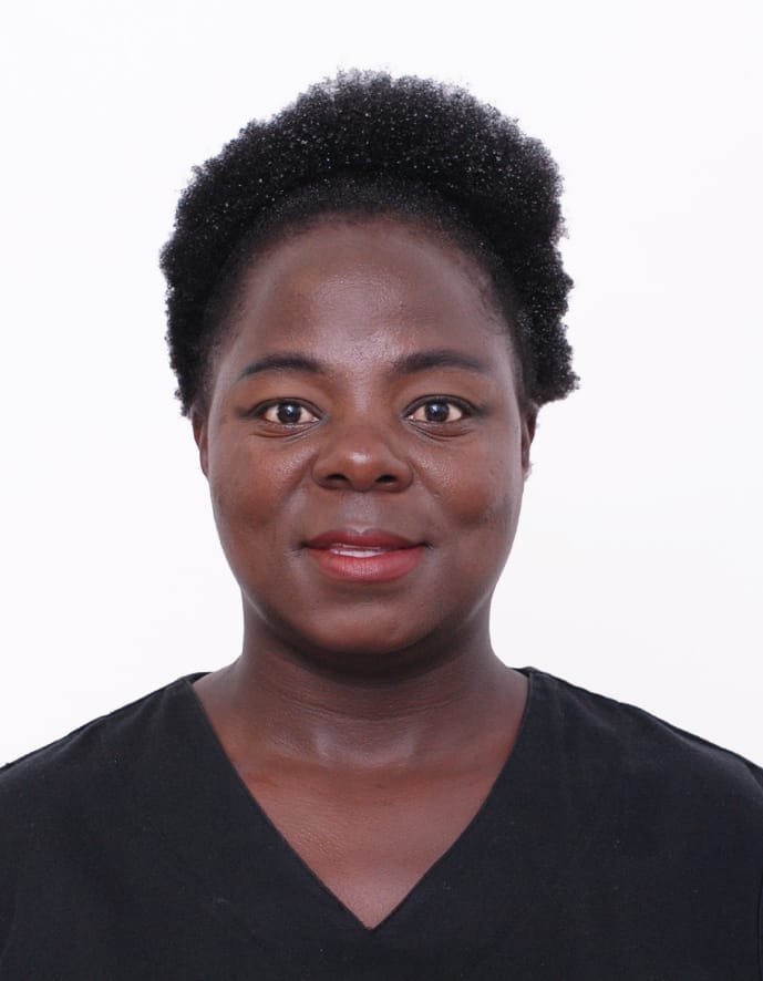  Portrait of a certified holistic practitioner offering personalized care at a peaceful skincare clinic.