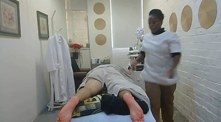A hydraglow facial treatment in progress, featuring a professional using specialized equipment and hydrating serums to deeply cleanse, exfoliate, and infuse the skin with moisture for a radiant, glowing complexion.