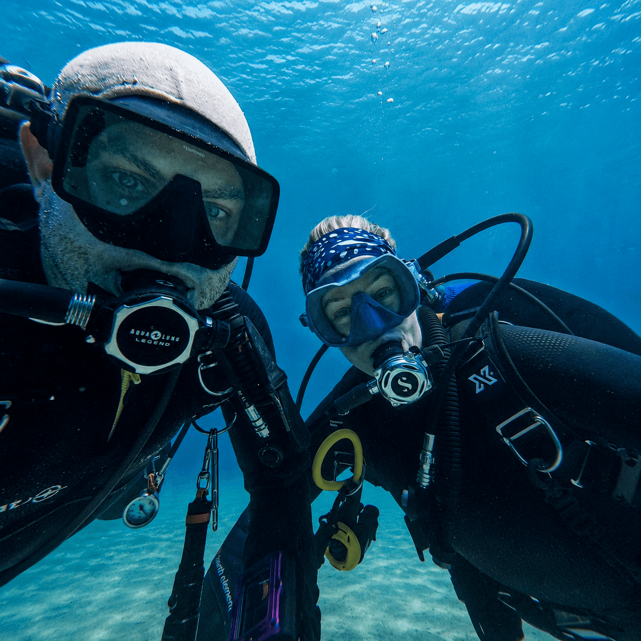 Robin and a Yoga Diver student underwater in Malta