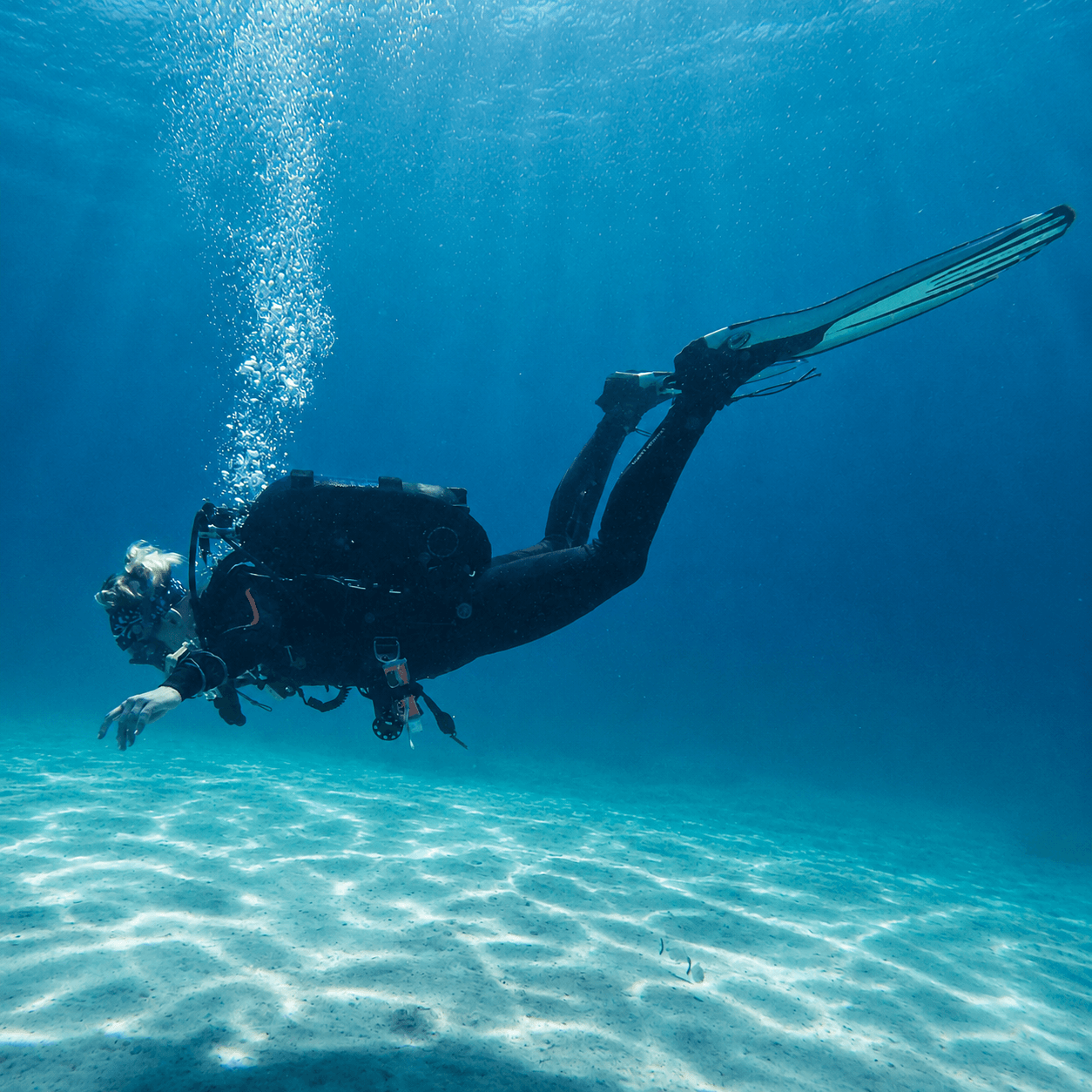 Yoga Diver student practising horizontal trim and buoyancy underwater