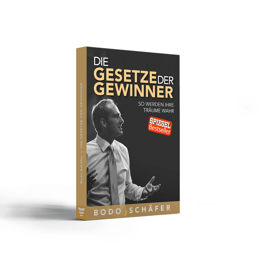 Buchcover „Die Gesetze der Gewinner“ von Bodo Schäfer mit schwarzem Hintergrund, goldener Schrift, Porträt des Autors im Anzug und Spiegel-Bestseller-Hinweis.
