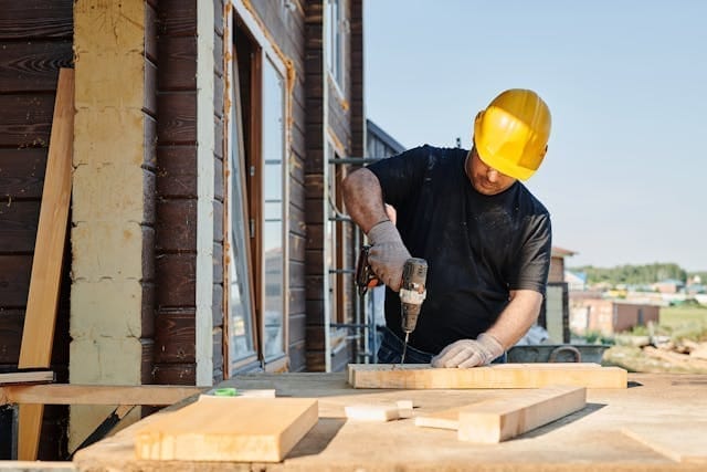 Man Drilling Wood