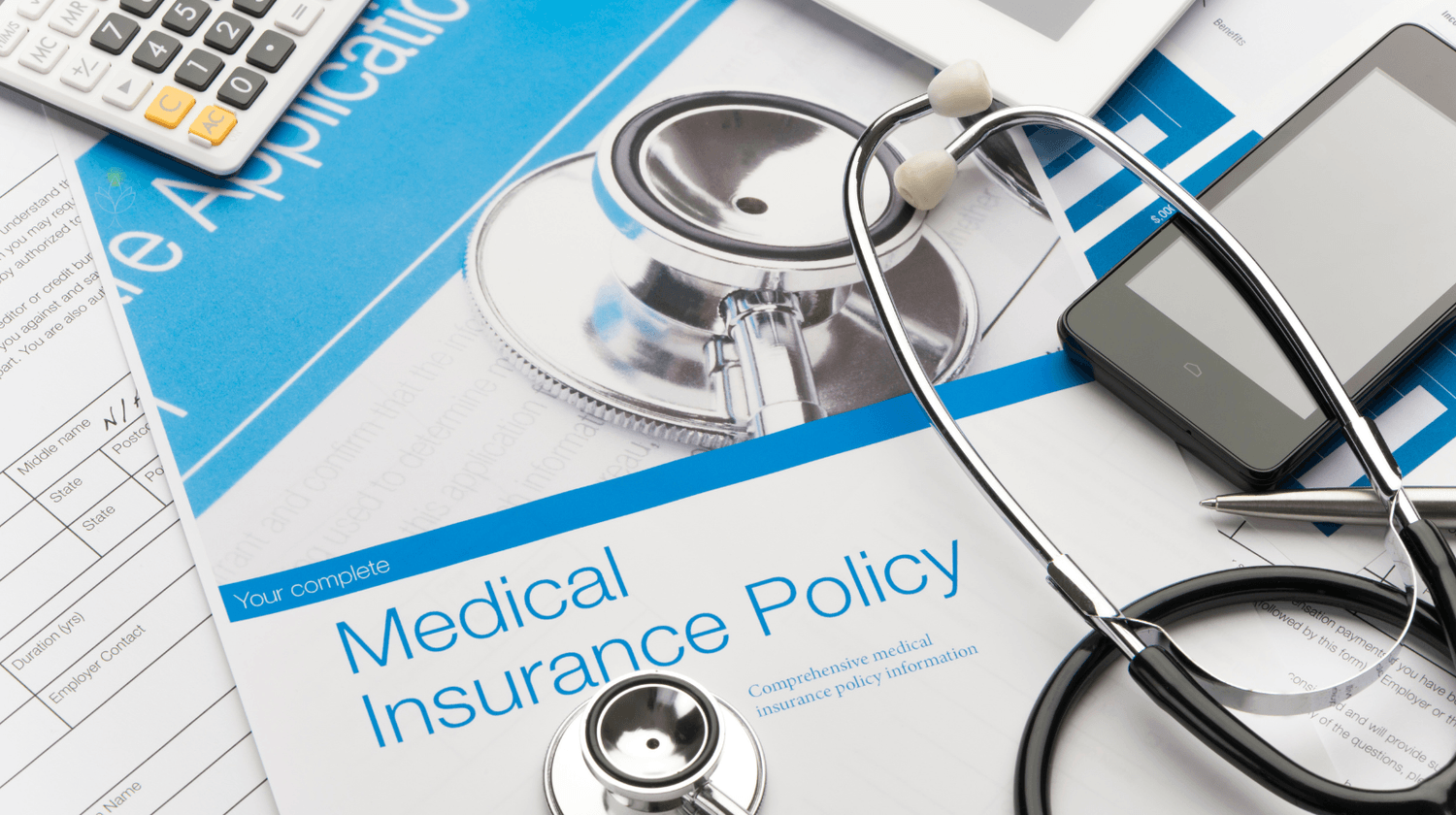 Medical insurance policy and stethoscope – importance of health checks and global health insurance before moving abroad.