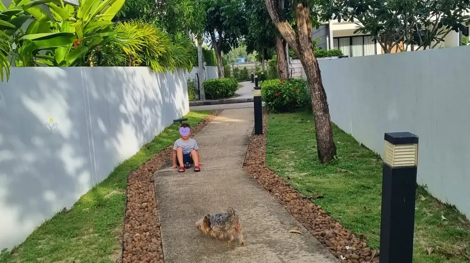 Modern villa with tropical garden in Laguna Bangtao Phuket Thailand, showing relaxed expat lifestyle and affordable comfort.
