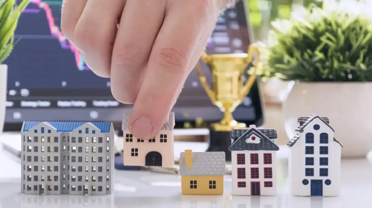 Real estate investor analyzing Dubai property market online — concept of buying or selling property in Dubai remotely from abroad.