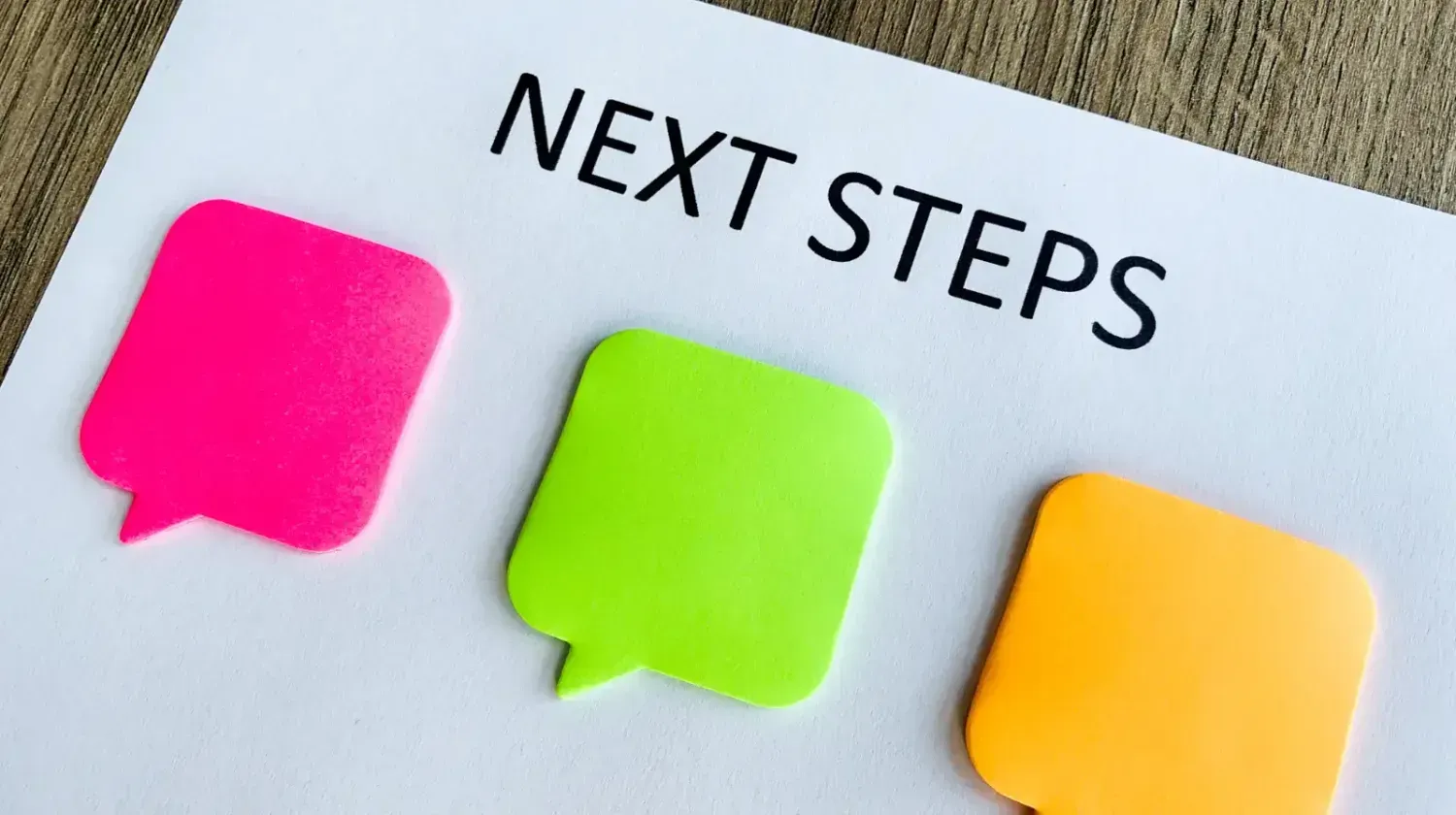 Colorful sticky notes with text ‘Next Steps’ — visual guide for next actions after buying a property in Dubai, from transfer to rental setup.