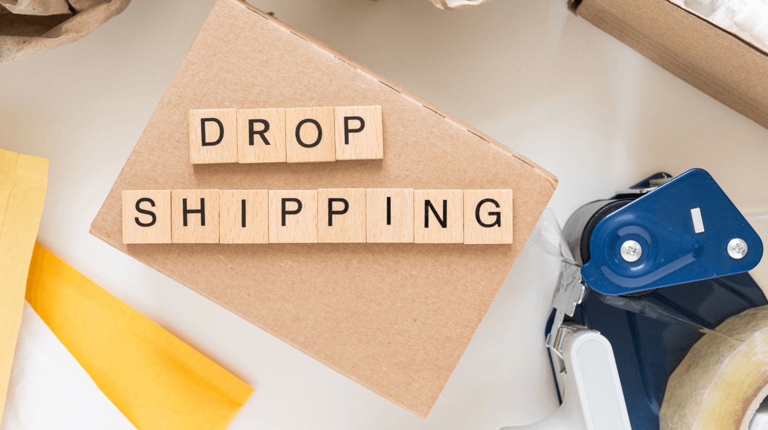 Dropshipping concept with shipping boxes, product tools and online business setup