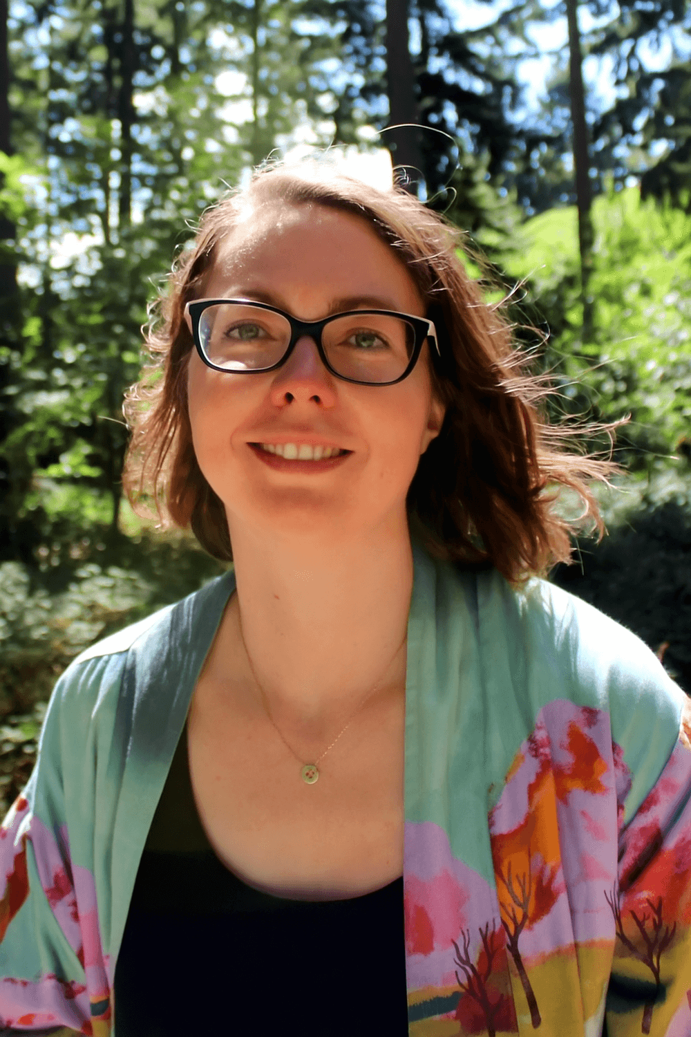 Portrait of blissko founder, a trauma-informed bodywork therapist based in Bruges
