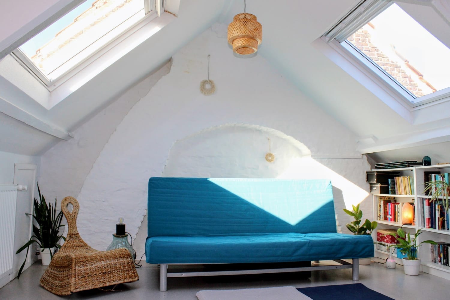 Photo of a cozy, light-filled attic studio in the Bruges city center
