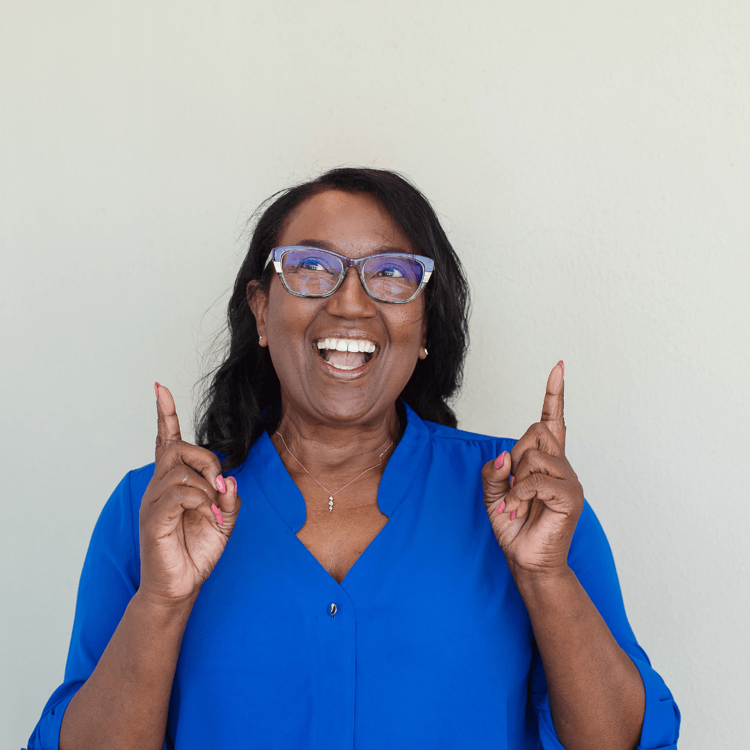 Avril pointing upwards showcasing growth