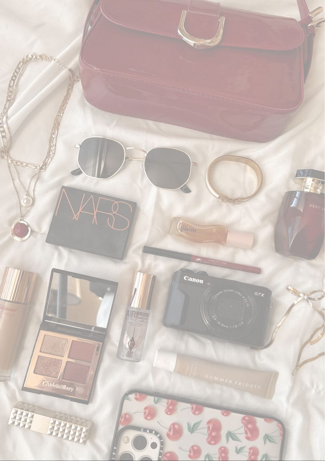 Woman's handbag contents laid out
