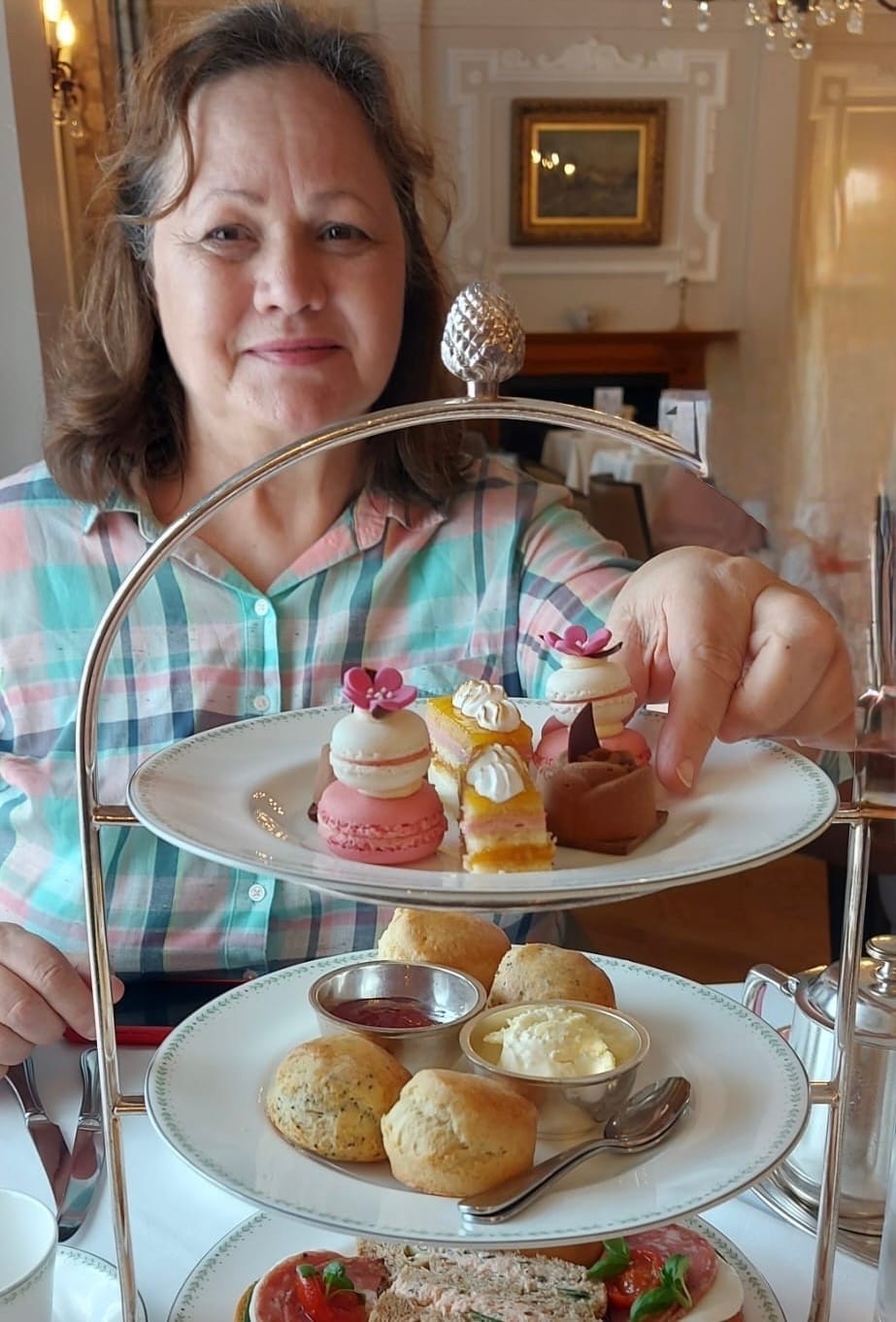 Sisters celebrating Quirky Quilt Art’s launch with high tea at Bettys Tearoom, Harrogate, toasting their supportive husbands