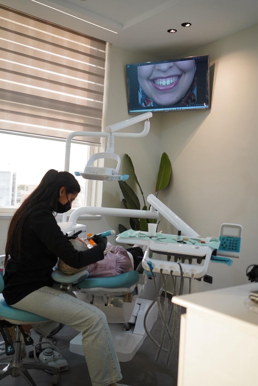 Dr Amira working in her clinic