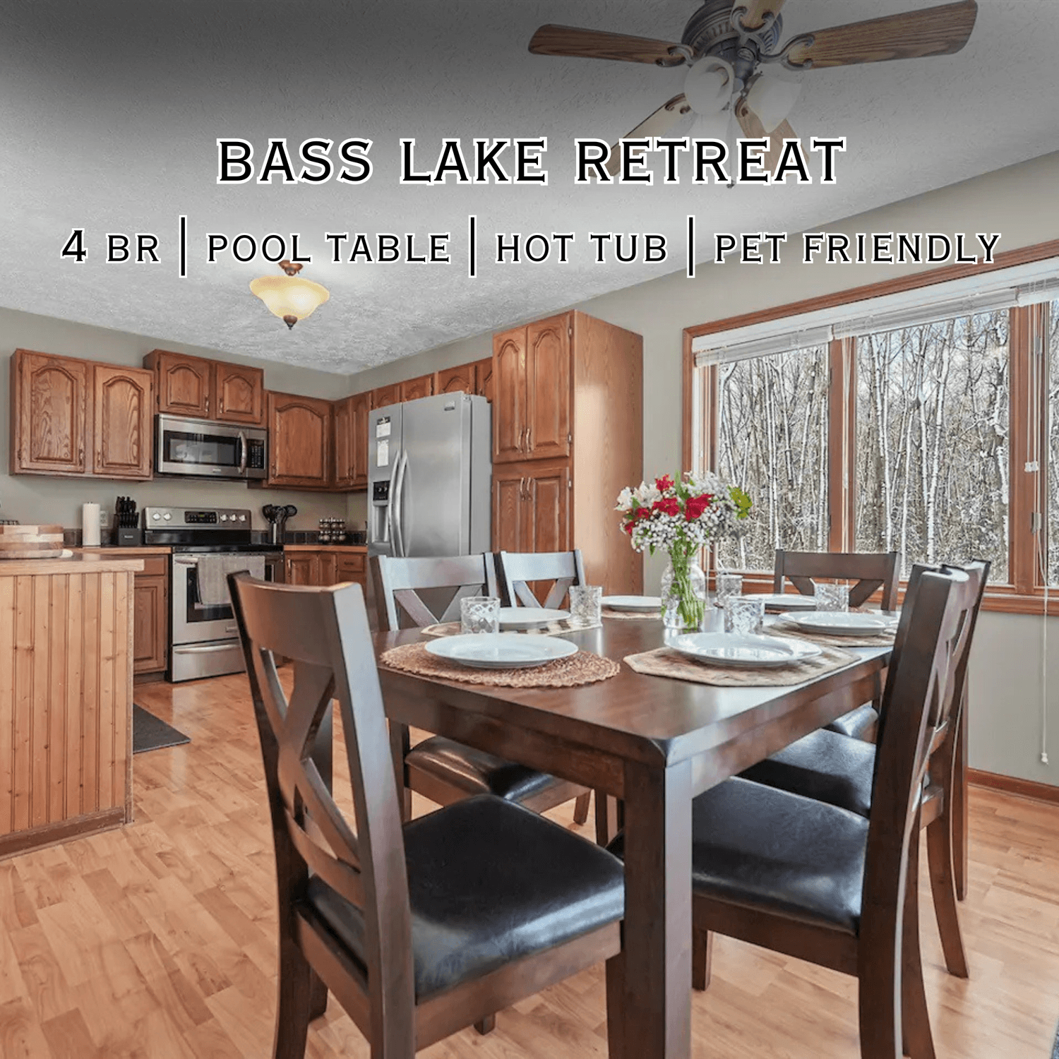 Traverse City vacation rental with 4 bedrooms, modern kitchen, and private hot tub near Moomer’s Ice Cream.
